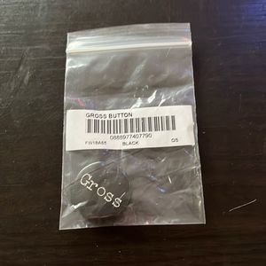 Supreme “gross” button 